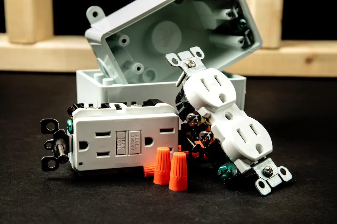 a generic standard 15 amp duplex outlet and a ground fault circuit interrupters (GFCI or GFI) outlet