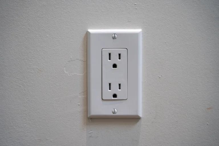 Wall outlet with an America-Canada style plug socket.