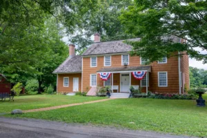 old Bethpage village restoration. Cloudy day in summer. Lawrence house.