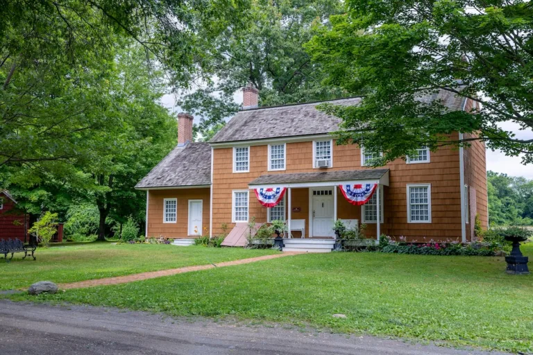 old Bethpage village restoration. Cloudy day in summer. Lawrence house.